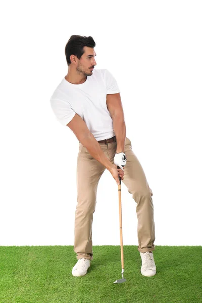 Fiatal férfi golfozik fehér alapon — Stock Fotó