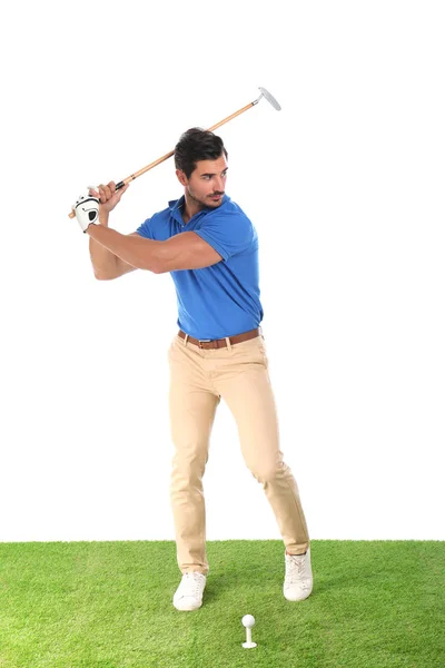 Ung man spelar golf på vit bakgrund — Stockfoto