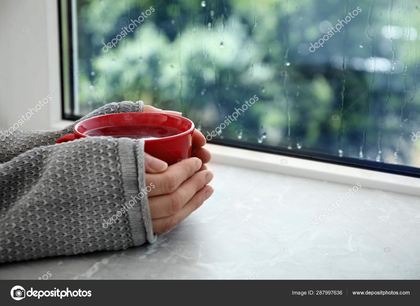 Woman With Cup Of Hot Tea Near Window On Rainy Day Closeup Space For Text Stock Photo By C Newafrica Woman With Cup Of Hot Tea Near Window On Rainy Day Closeup Space For Text Stock Photo By C Newafrica