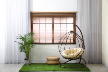 Salıncak sandalyeli şık ve modern oda iç mekan