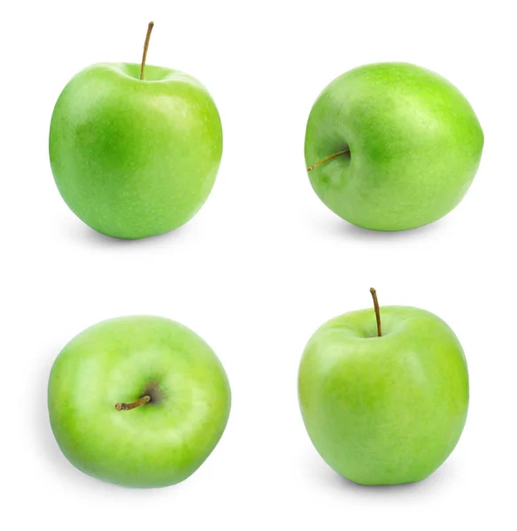 Joukko mehukkaita tuoreita vihreitä omenoita valkoisella taustalla — kuvapankkivalokuva