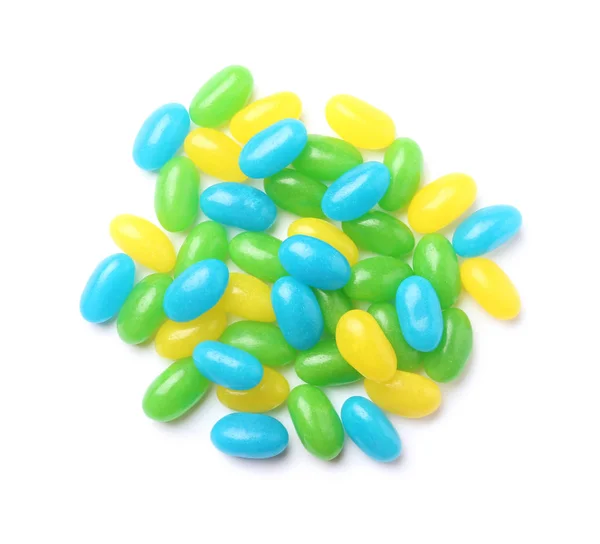 Pile of tasty bright jelly beans isolated on white, top view — Stock Photo, Image