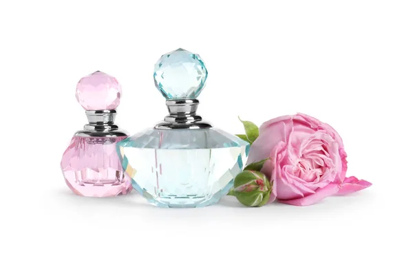 Bottles of luxury perfume and beautiful flower isolated on white — Stock Photo, Image