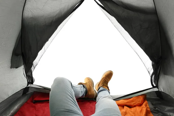 Крупный план человека в палатке кемпинга на белом фоне, вид изнутри — стоковое фото