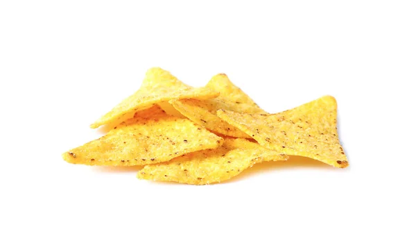 Hög med läckra mexikanska nachos chips på vit bakgrund — Stockfoto