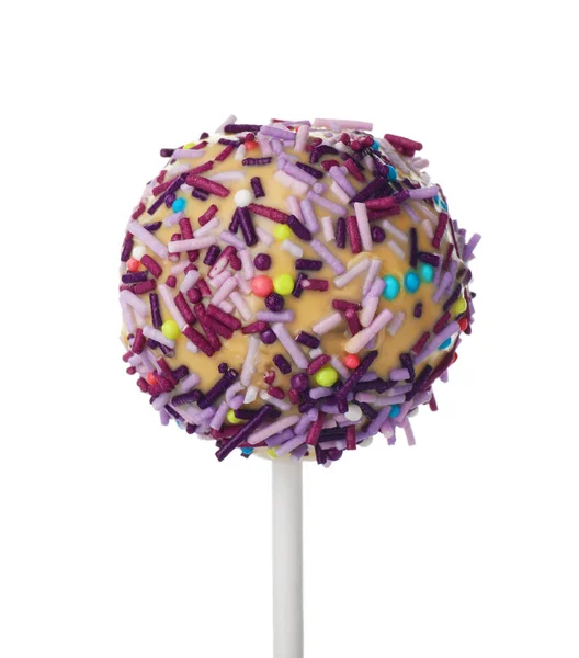 Tasty cake pop with colorful sprinkles isolated on white — Stock Photo, Image