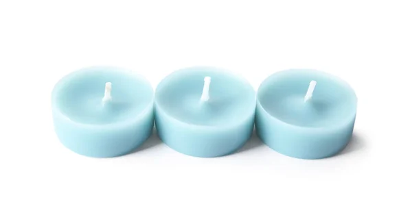 Světle modrý vosk dekorativní svíčky izolované na bílém — Stock fotografie