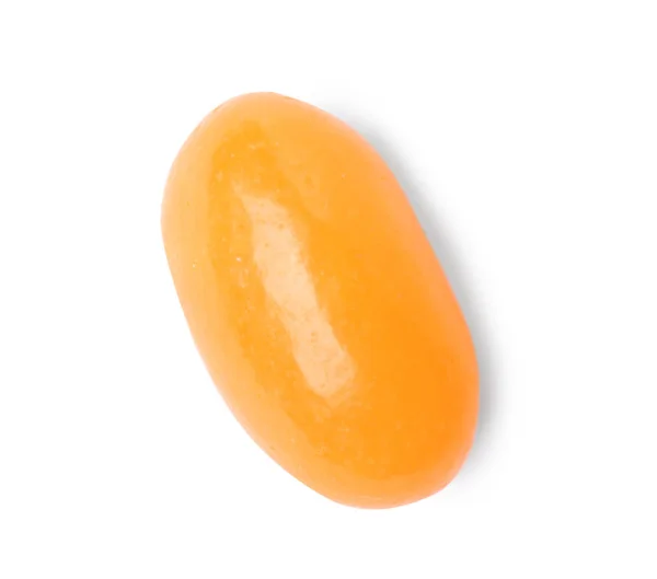 Smakelijke oranje Jelly Bean geïsoleerd op wit, bovenaanzicht — Stockfoto