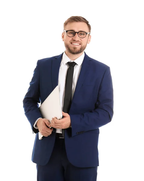 Щасливий молодий бізнесмен тримає ноутбук на білому тлі — стокове фото