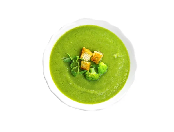 Bowl of broccoli cream soup with croutons on white background, top view — Stock Photo, Image