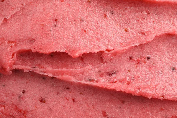 Delicious strawberry ice cream as background, closeup Stock Photo