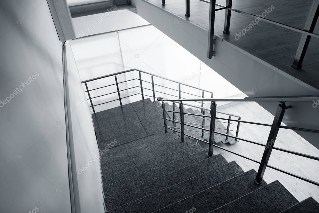 Stone stairs with metal railing indoors, view through CCTV camera