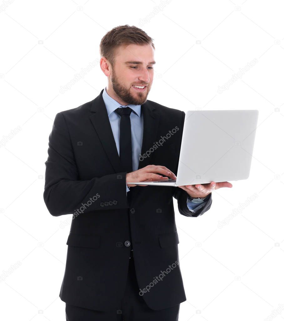 Happy young businessman using laptop on white background