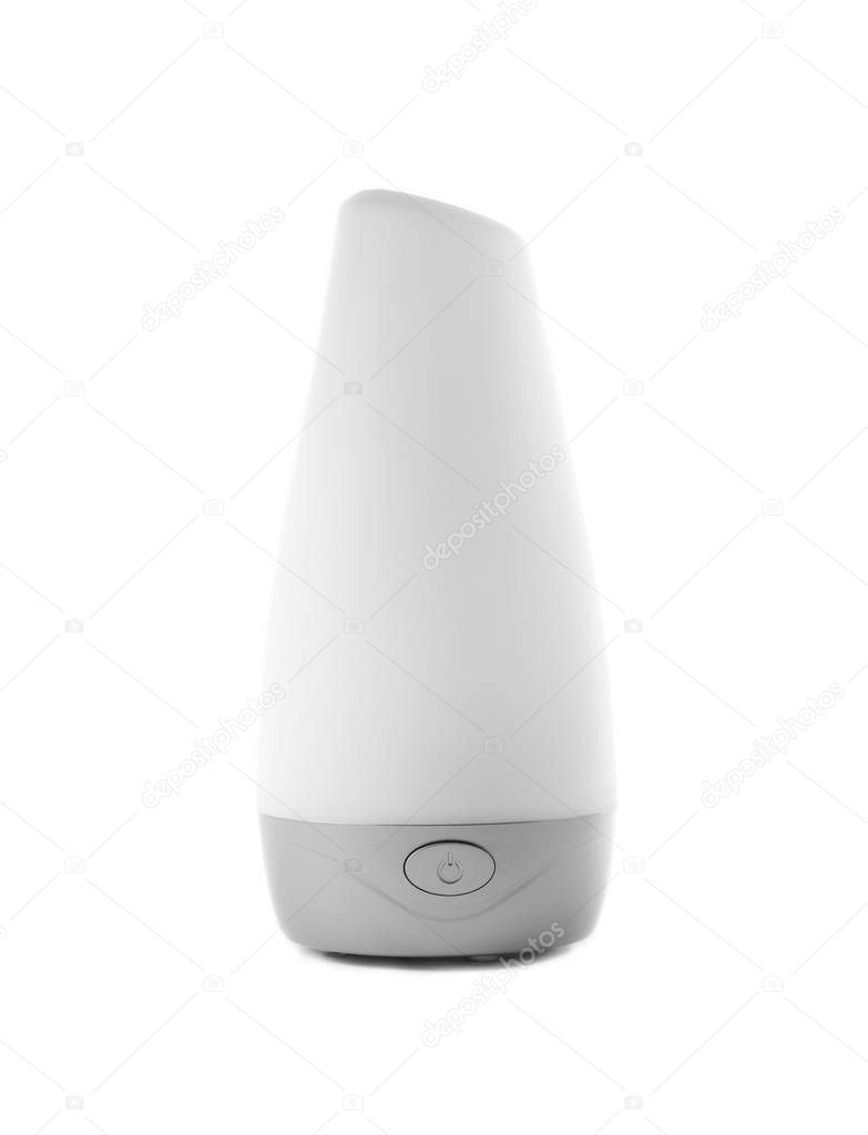 New modern aroma humidifier on white background