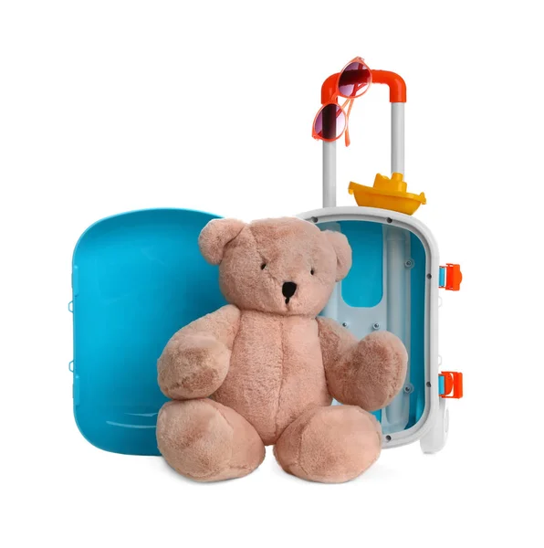 Composition with stylish little blue suitcase and teddy bear on white background — Stock Photo, Image