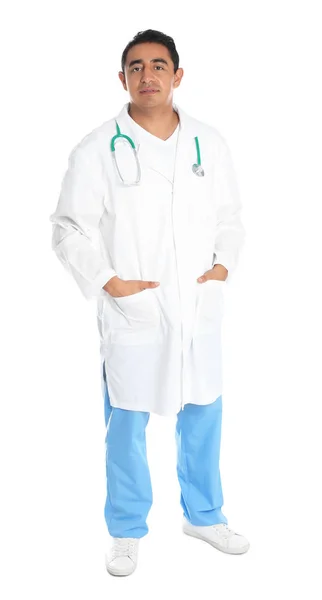 Full length portrait of male Hispanic doctor isolated on white. Medical staff — Stock Photo, Image