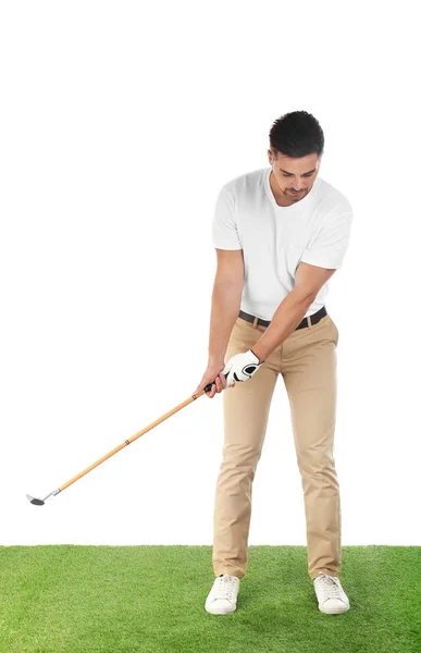 Молодий чоловік грає в гольф на білому тлі — стокове фото