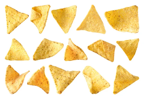 Uppsättning läckra mexikanska nachos chips på vit bakgrund, uppifrån — Stockfoto