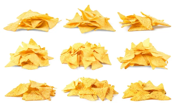 Set of delicious Mexican nachos chips on white background — Stock Photo, Image