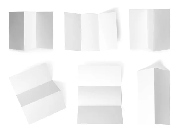 Uppsättning av tomma broschyrer på vit bakgrund. Mock-up för design — Stockfoto