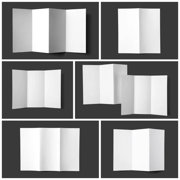 Set of blank brochures on dark grey background, top view. Mock up for design — Stock Photo, Image
