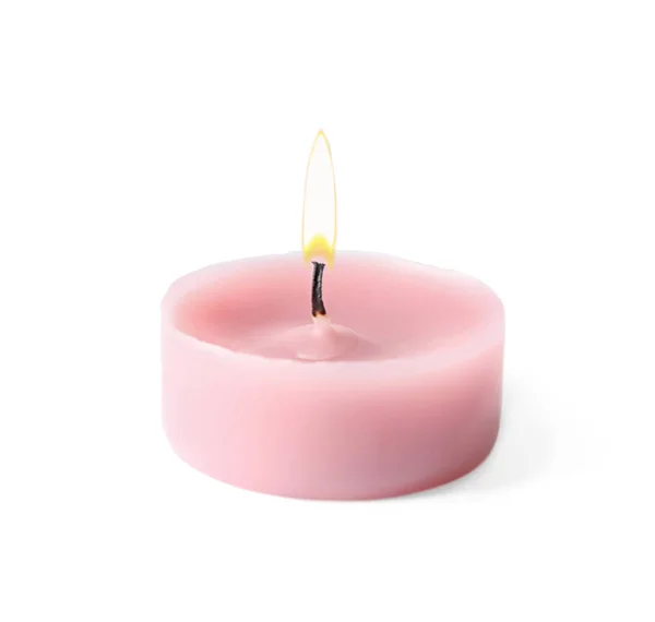 Dekorativní svíčka s růžovým voskem izolovaná na bílém — Stock fotografie