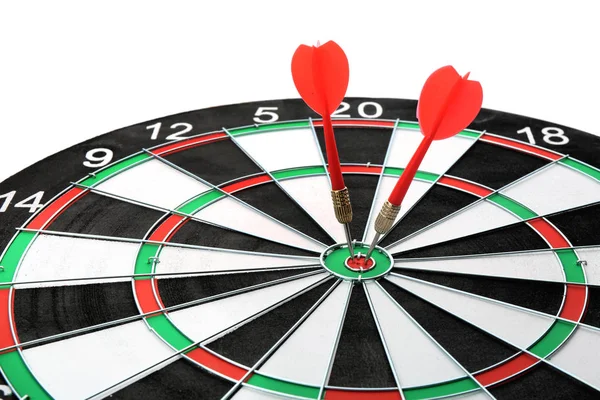 Dart board with color arrows hitting target, closeup — Stock Photo, Image