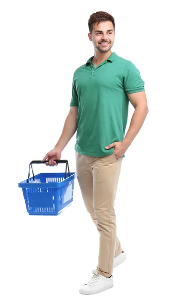 Young man with empty shopping basket isolated on white — Stock Photo, Image