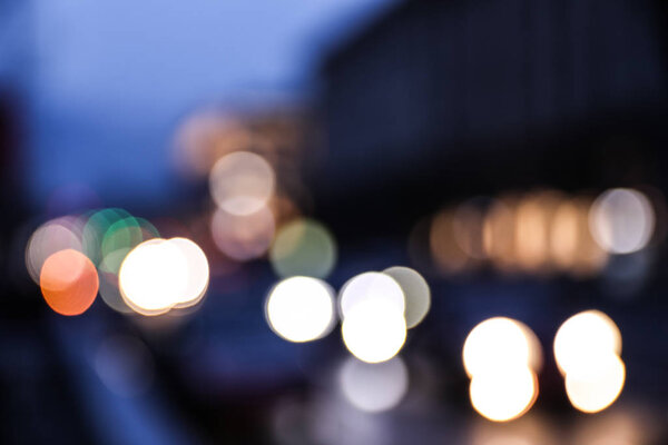 Blurred view of modern city at evening. Bokeh effect