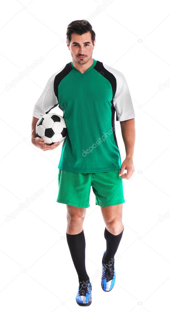 Young football player with ball on white background