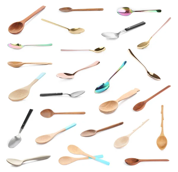 Set di cucchiai diversi su sfondo bianco — Foto Stock
