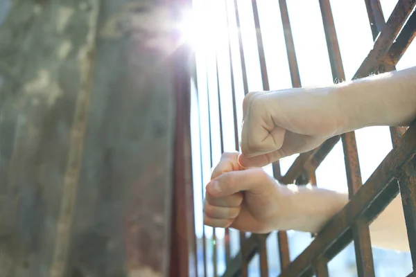 Man detained in jail outdoors, space for text. Criminal law — Stock Photo, Image