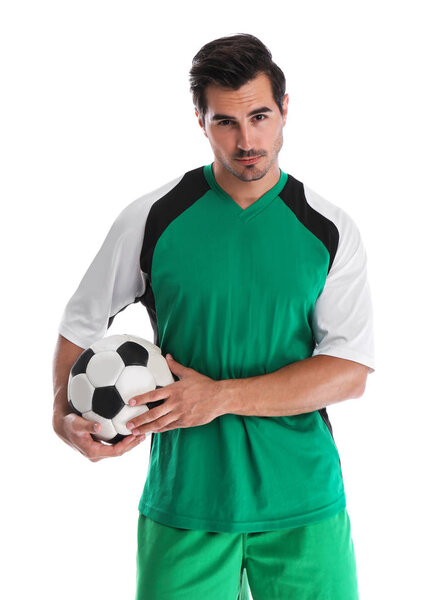 Young football player with ball on white background