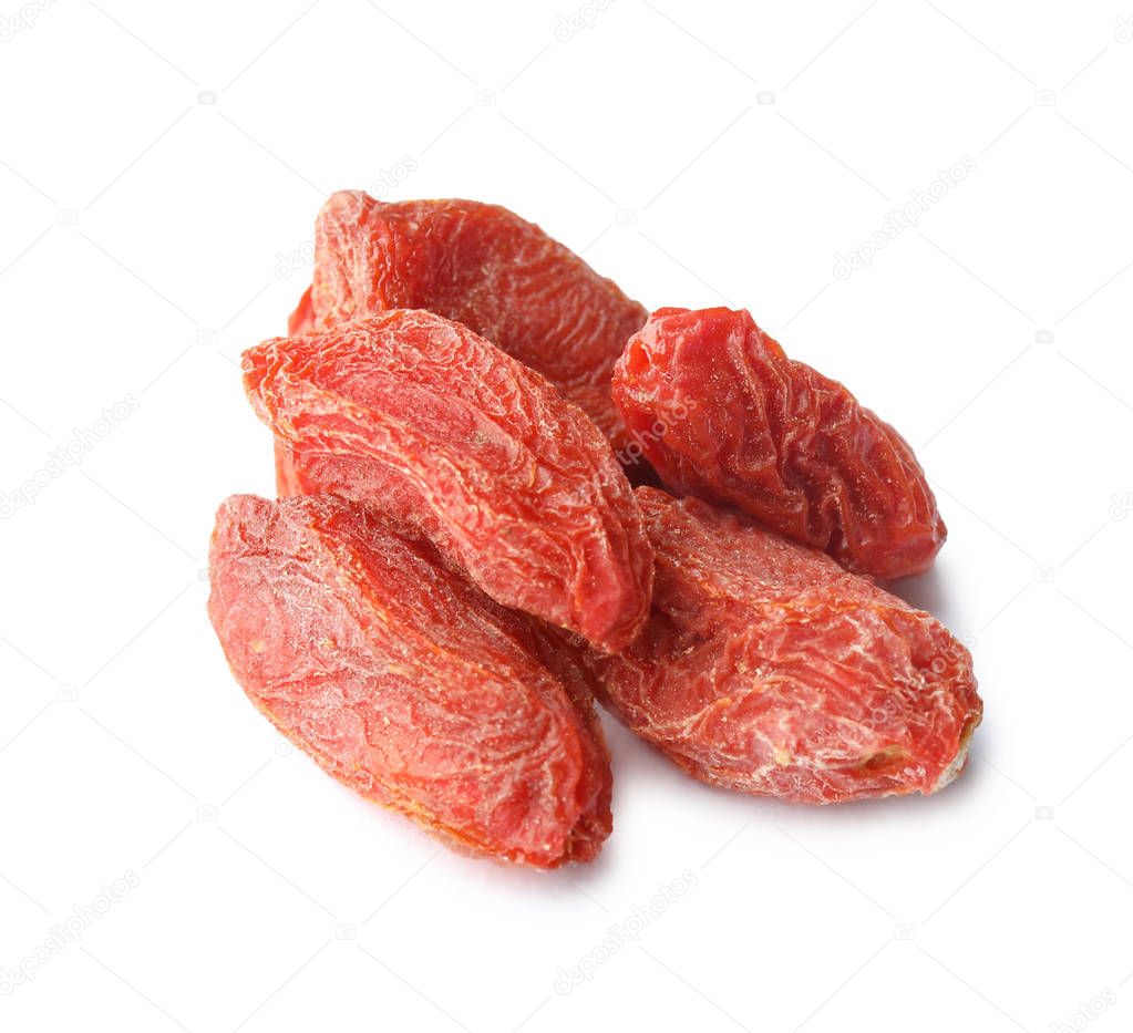 Pile of dried goji berries on white background