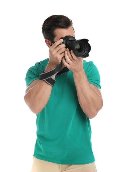 Joven fotógrafo profesional tomando fotos sobre fondo blanco —  Fotos de Stock