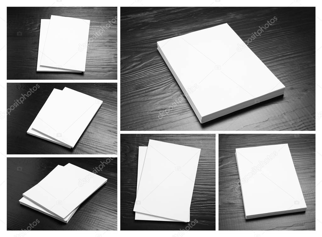 Set of blank brochures on black wooden table. Mock up for design