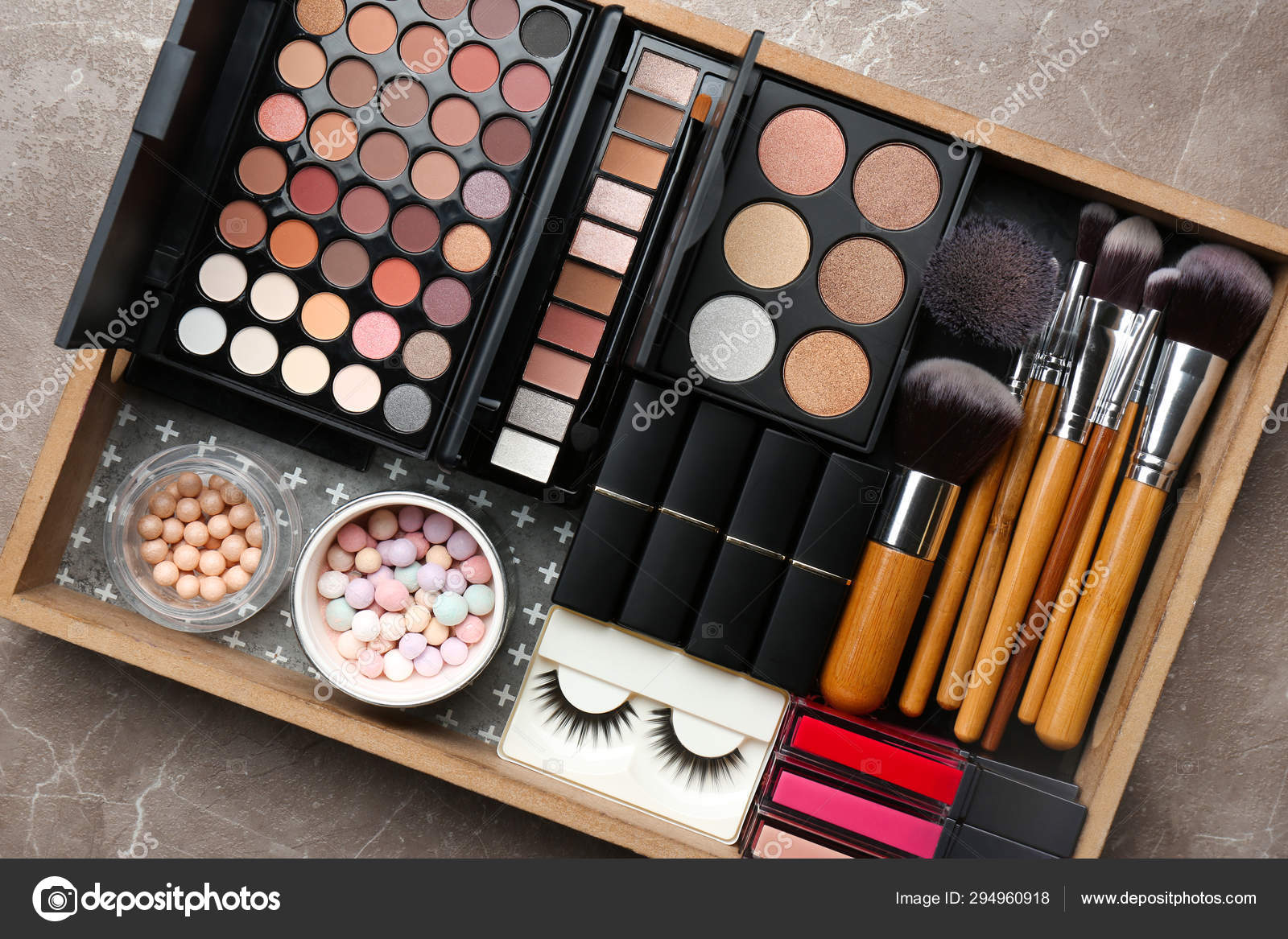 Set of different professional makeup products in box on top view Stock by ©NewAfrica 294960918