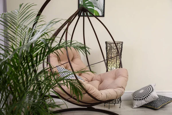 Comfortable swing chair with pillows in room interior — Stock Photo, Image