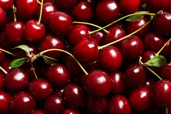 Delicious ripe sweet cherries as background, closeup view — Stock Photo, Image