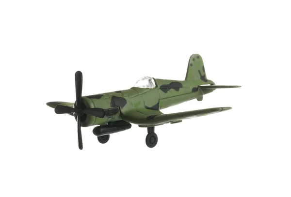 Avión militar de juguete vintage sobre fondo blanco —  Fotos de Stock