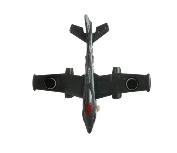 Современный игрушечный военный самолет на белом фоне, вид сверху — стоковое фото