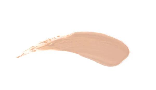 Sample of liquid foundation foundation on white background, top view