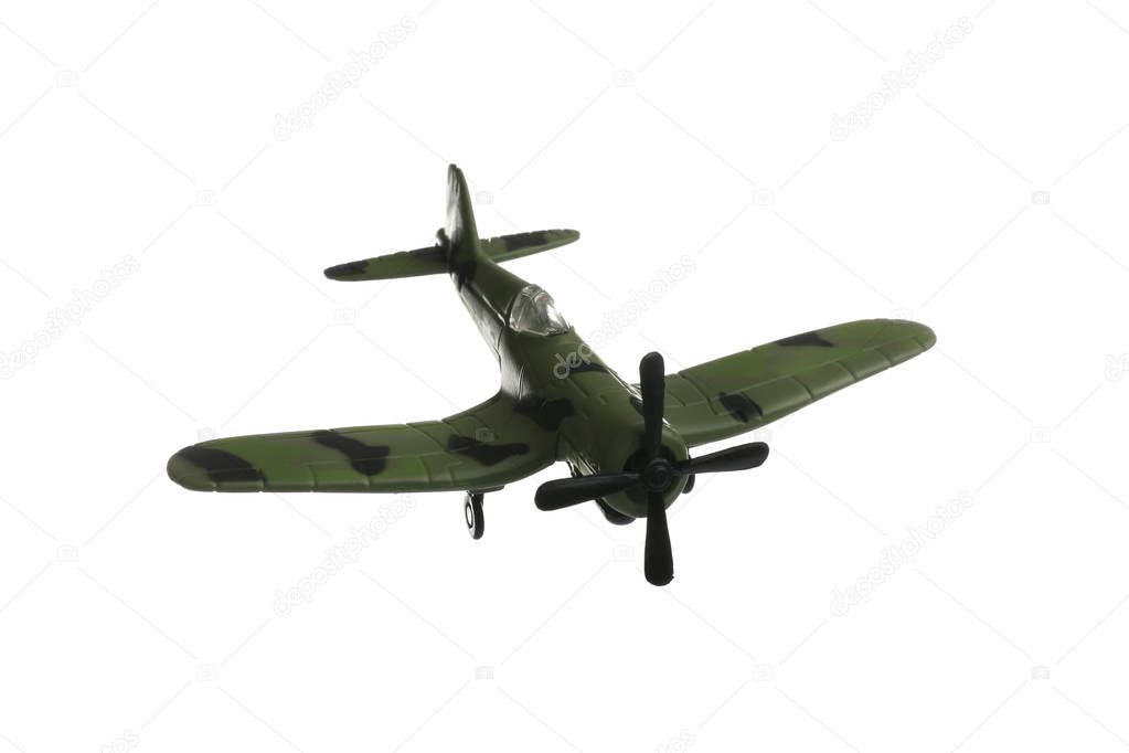 Vintage toy military airplane on white background