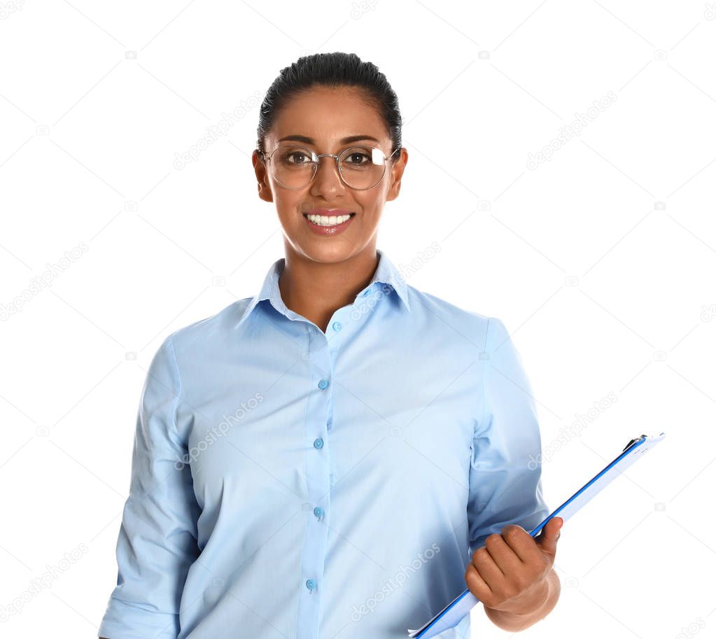 Beautiful Hispanic businesswoman with clipboard on white background