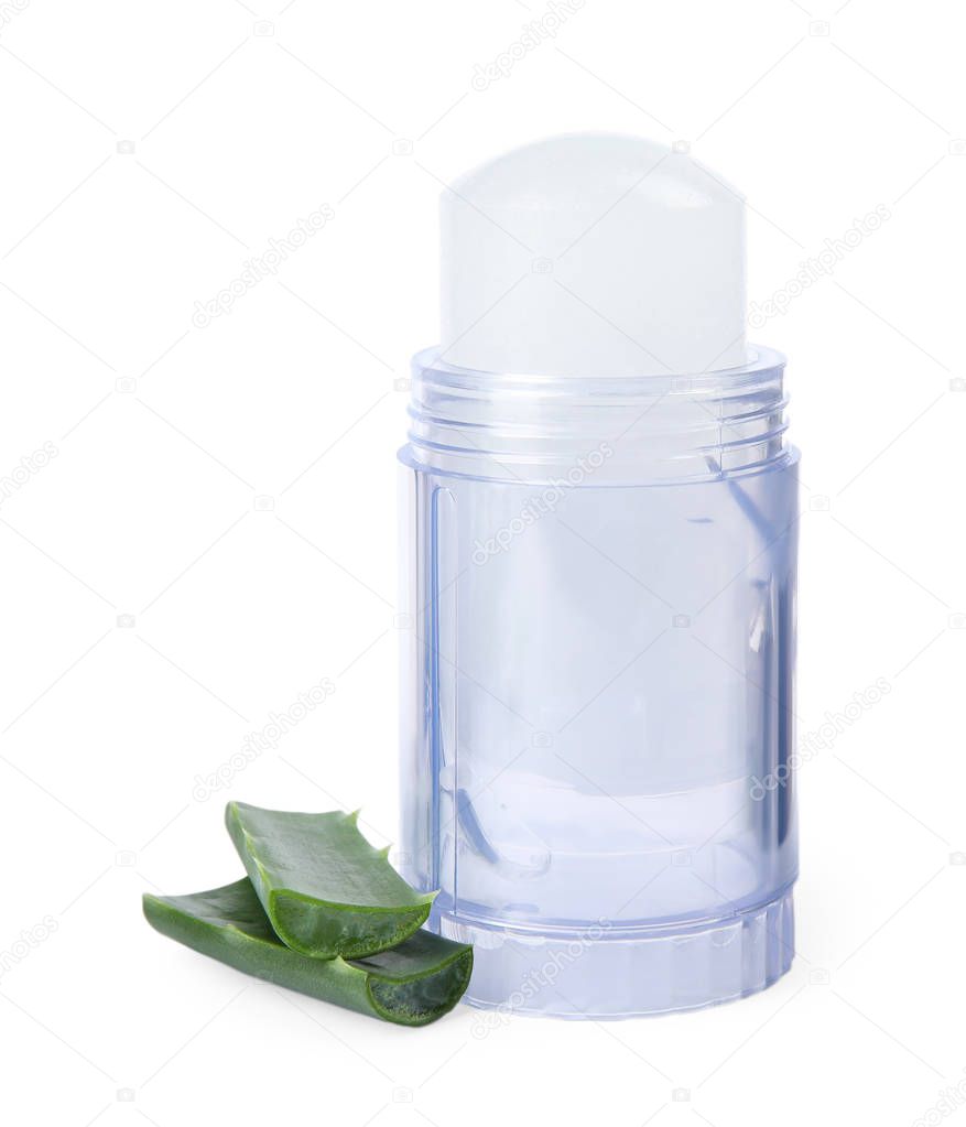 Natural crystal alum deodorant and fresh aloe on white background