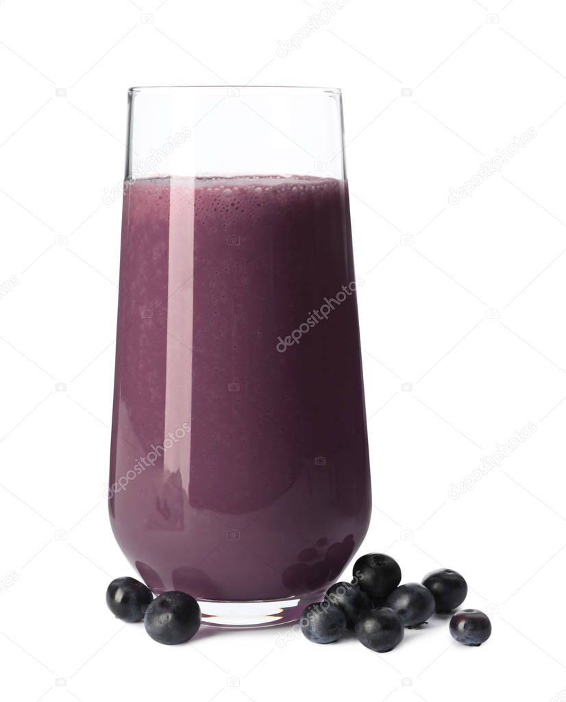 Glass of acai drink with berries on white background