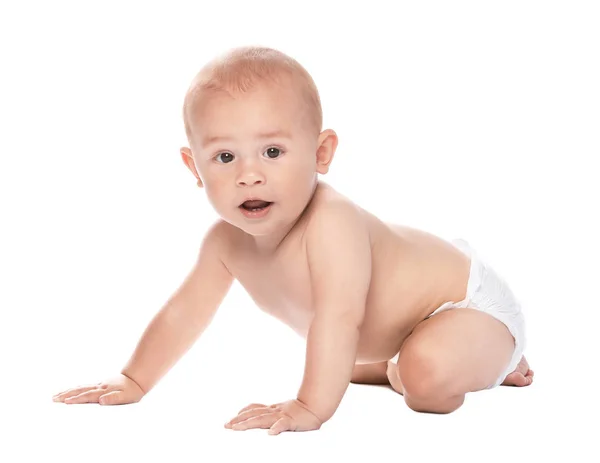 Lindo bebé arrastrándose sobre fondo blanco — Foto de Stock