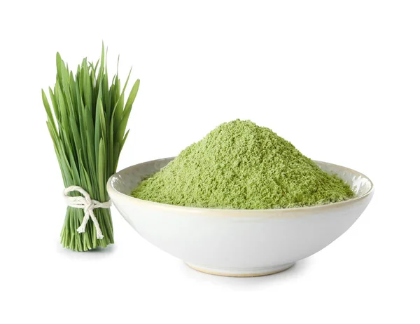 Fresh wheat grass and bowl with powder on white background — Stock Photo, Image