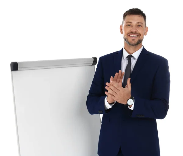 Entrenador profesional de negocios cerca del rotafolio sobre fondo blanco. Espacio para texto — Foto de Stock