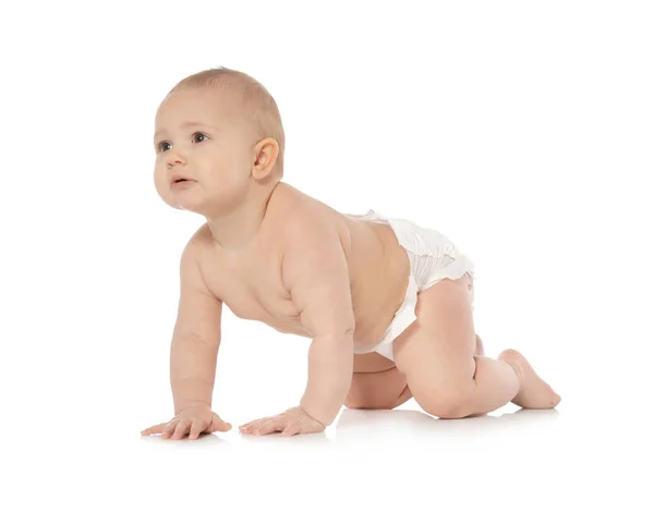 Carino piccolo bambino strisciando su sfondo bianco — Foto Stock